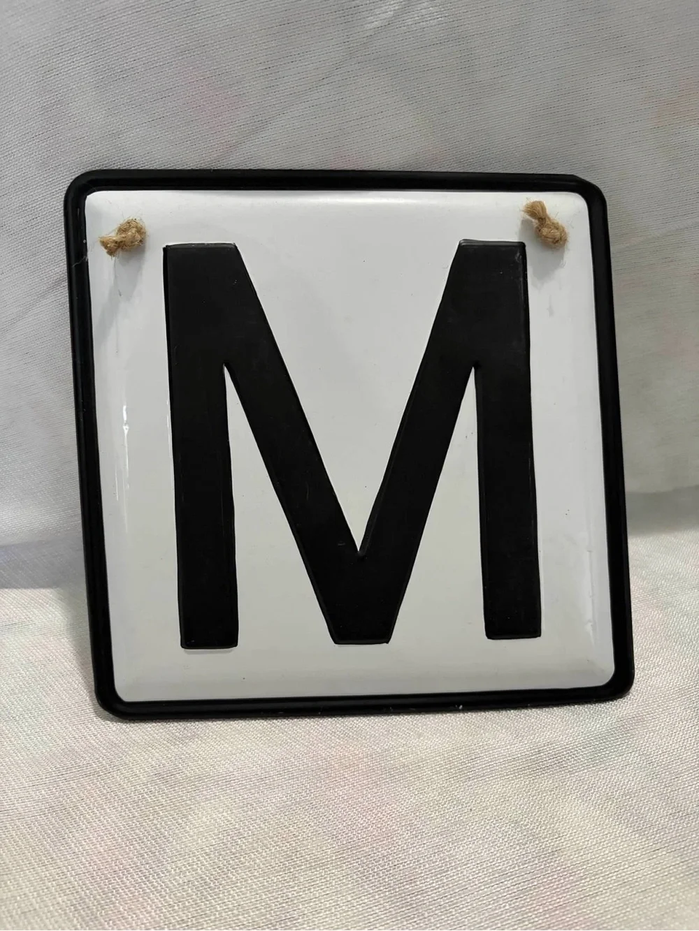 Black and White 'M' Hanging Wall Sign